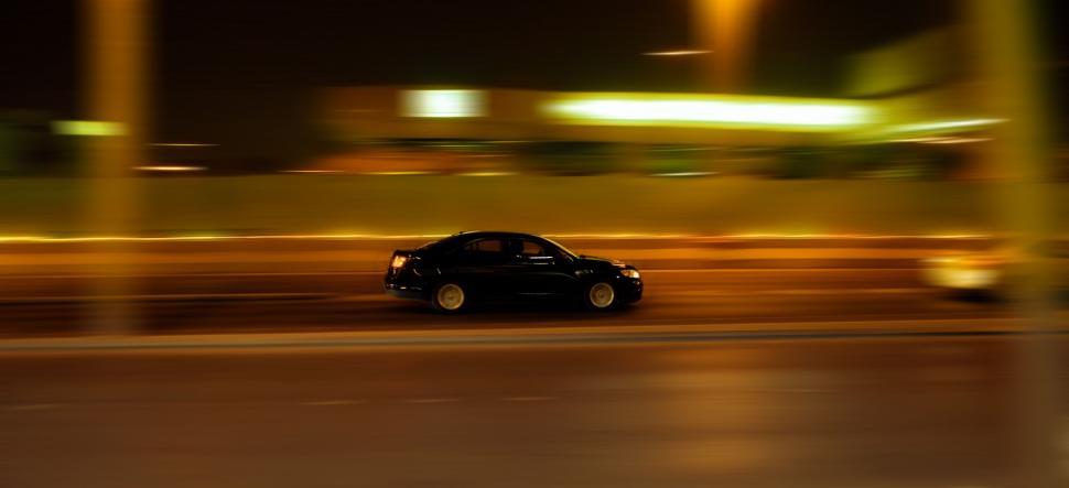 Free Image of Fast Moving Car on Road  