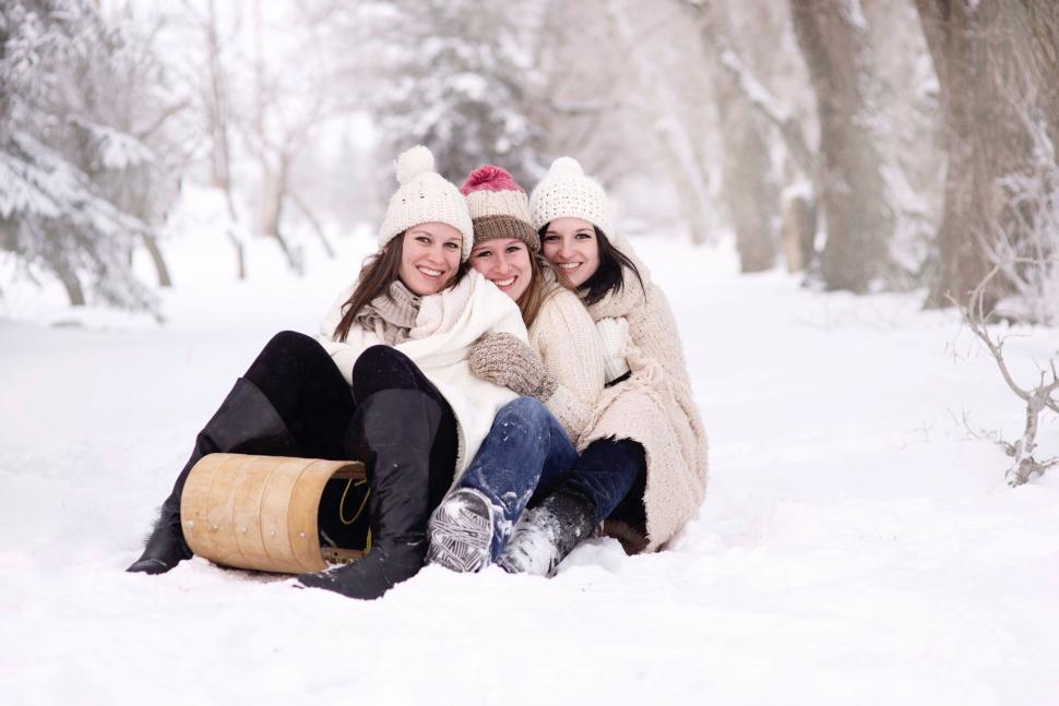 Free Image of Three Women Friends on toboggan 