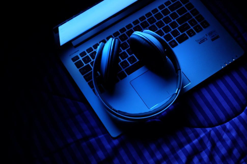 Free Image of Notebook and Headphones  