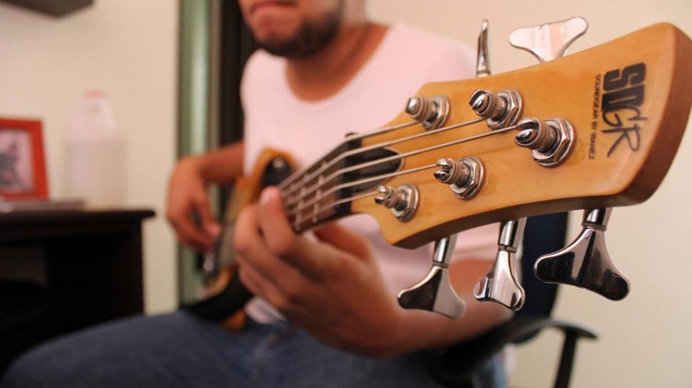 Free Image of Fingers on Guitar Strings  