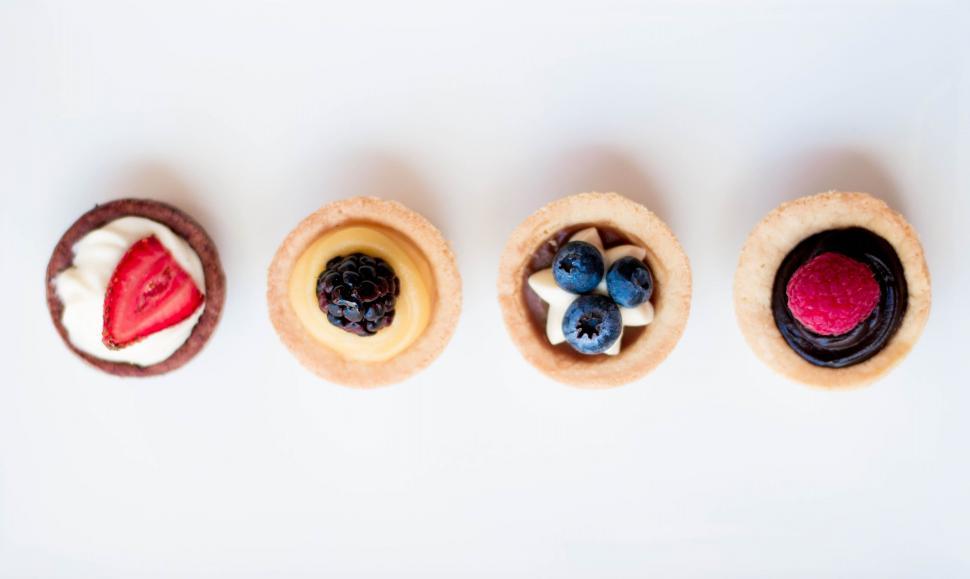 Free Image of Four Cup Cakes  