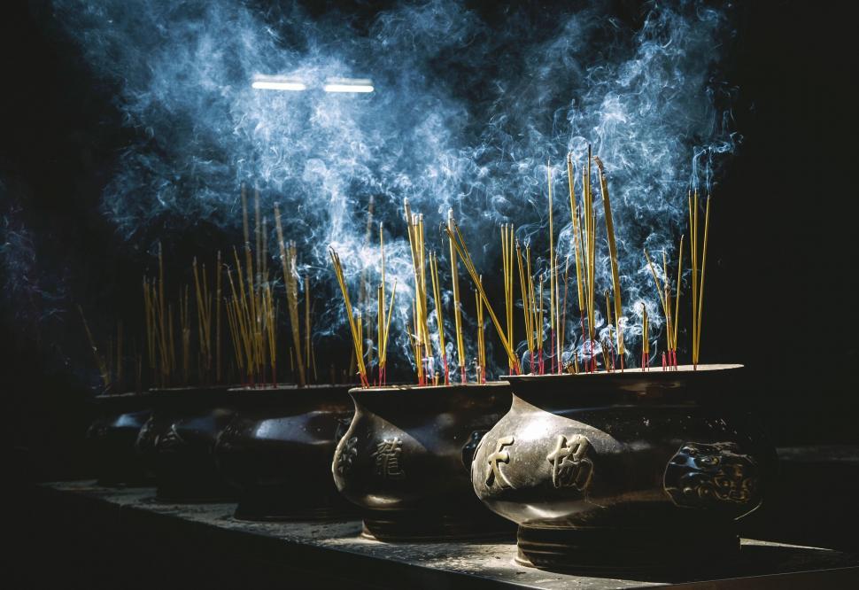Free Image of Incense sticks in pots  