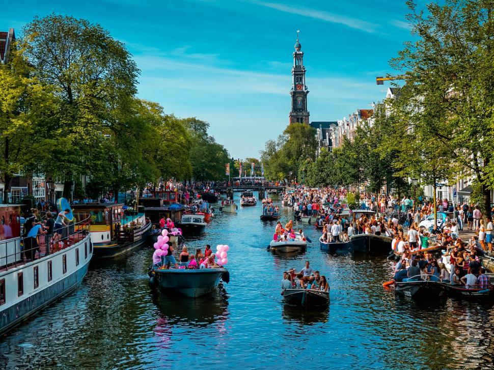 Free Image of Boats and Tourists  