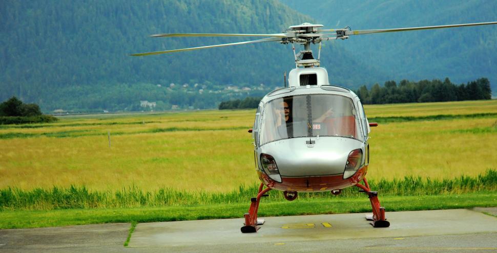 Free Image of Helicopter parked at the helipad 