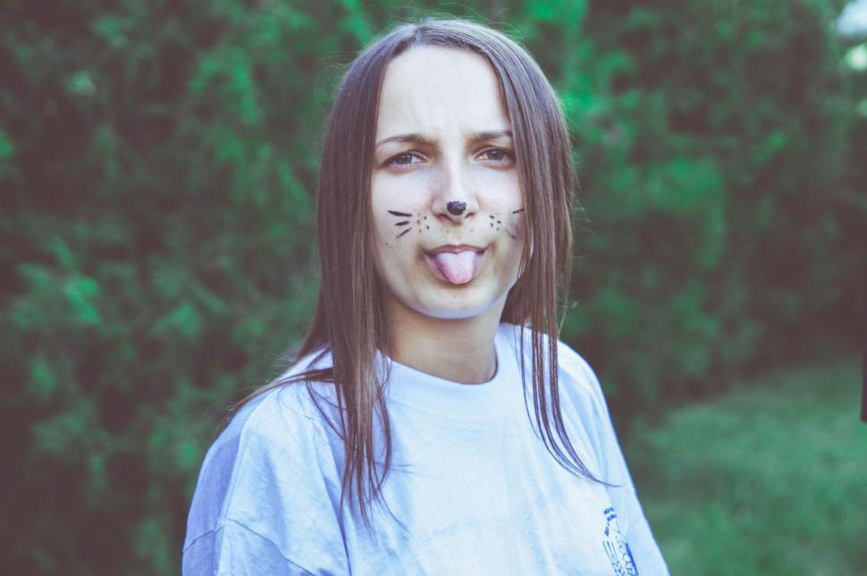 Free Image of Portrait Of Young Woman with tongue out  