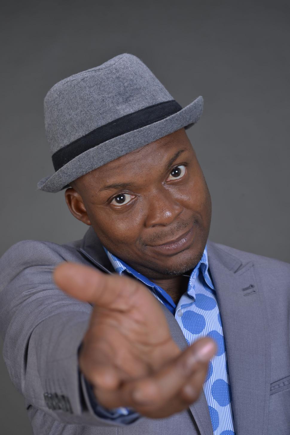 Free Image of Portrait Of african Man Giving A Hand to help  