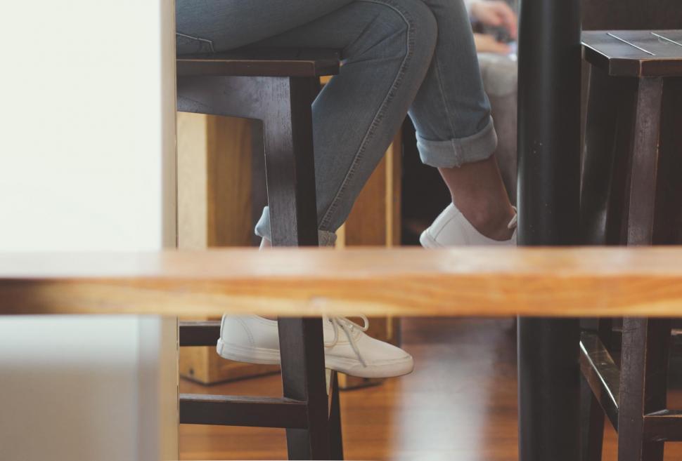 Free Image of White Sneakers in Feet 