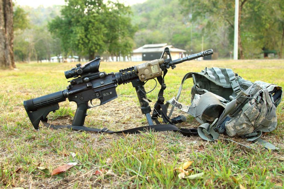 Free Image of Machine Gun and bulletproof jacket  