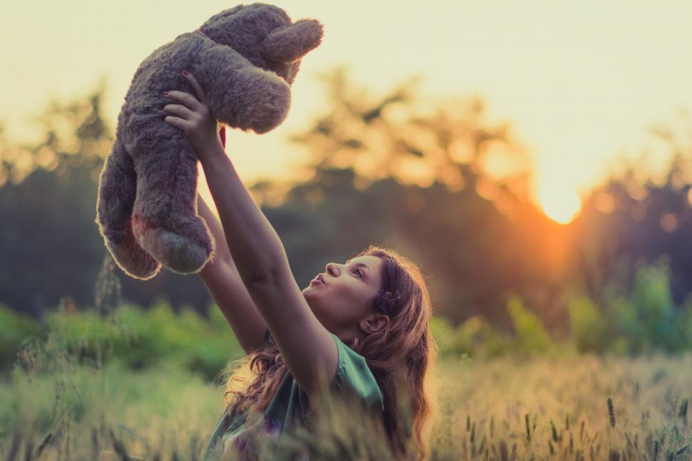 Free Image of Playing with Teddy bear  