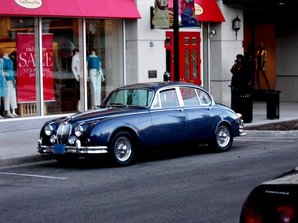 Free Image of Blue Car Parked on Side of Road 