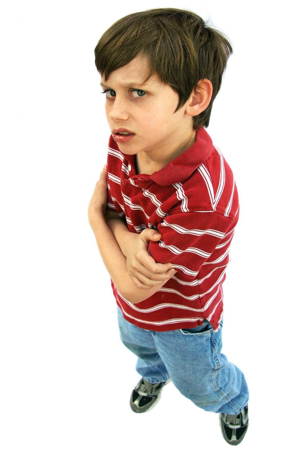 Free Image of LIttle boy looking defensive 
