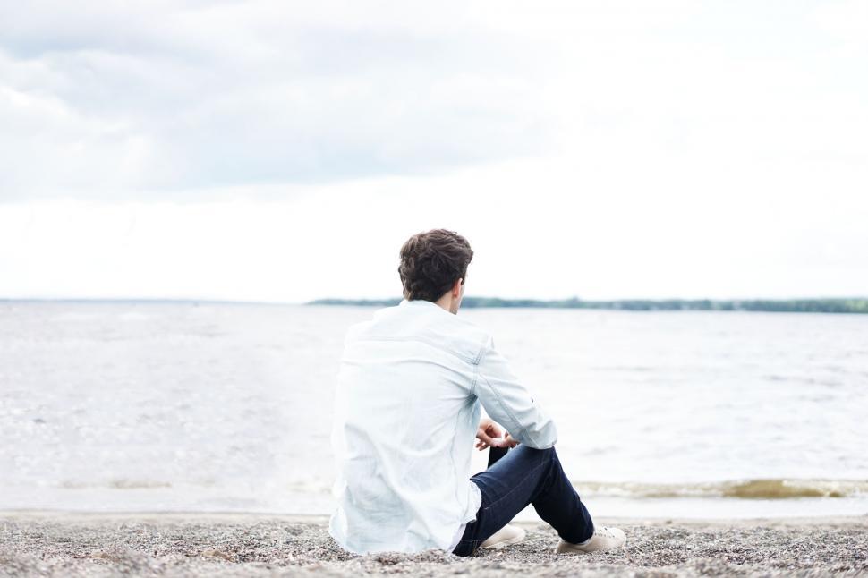 Free Image of Back side View of Alone Man on Beach  