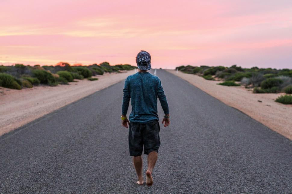 Free Image of Barefoot Man on Road  