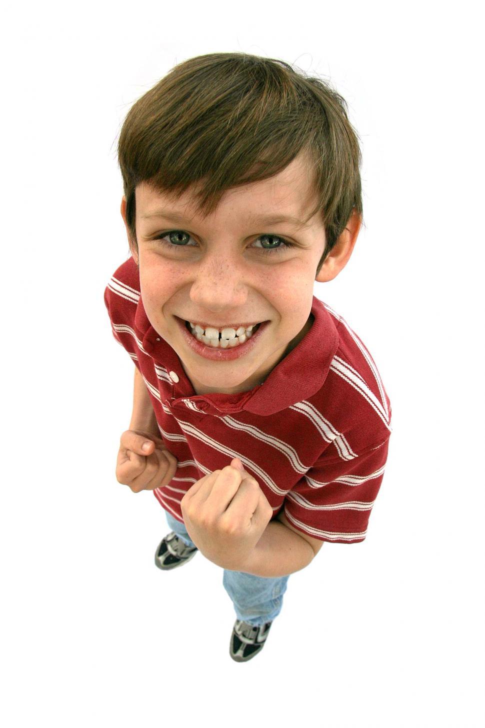 Free Image of Happy kid with balled fists 