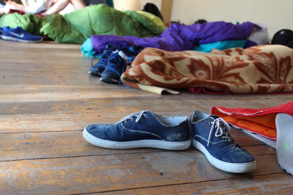 Free Image of Shoes on wooden planks  