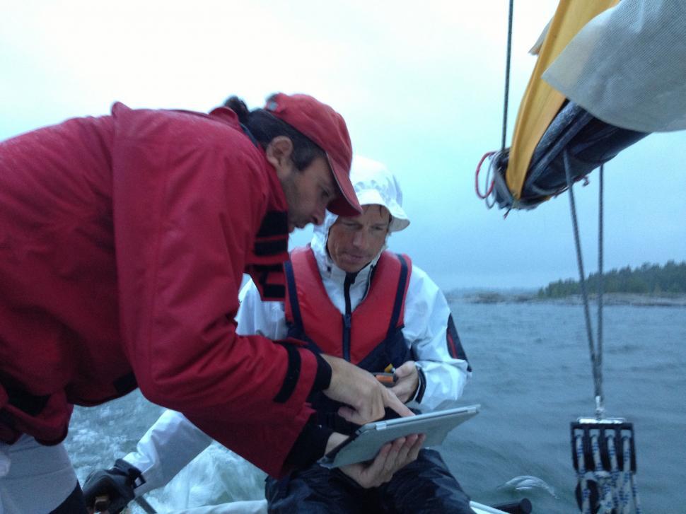 Free Image of Two People on Ship With Tablet Computer  