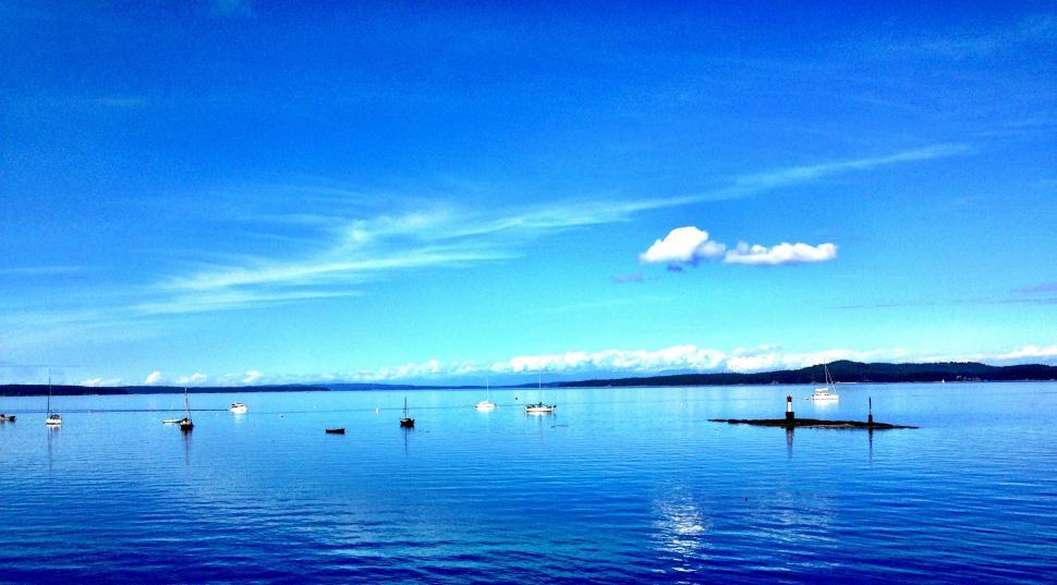 Free Image of Sea with Blue sky reflection  
