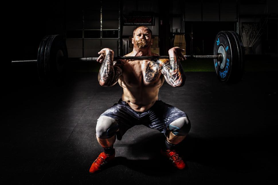 Free Image of Young Man lifting barbells 