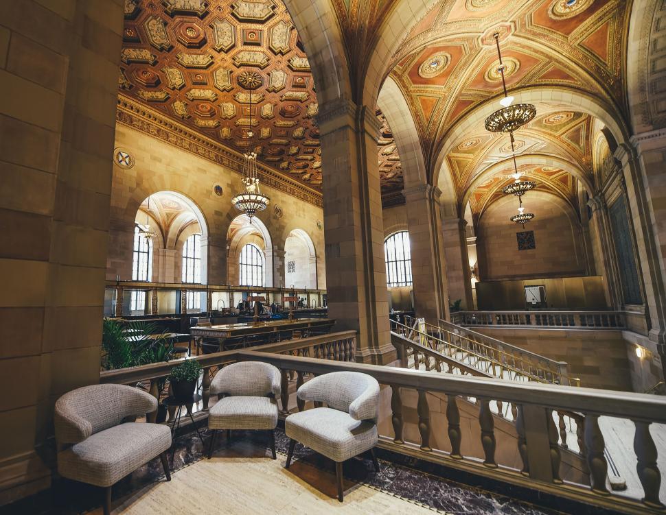 Free Image of Interiors of Concrete Building with chairs and stairs  