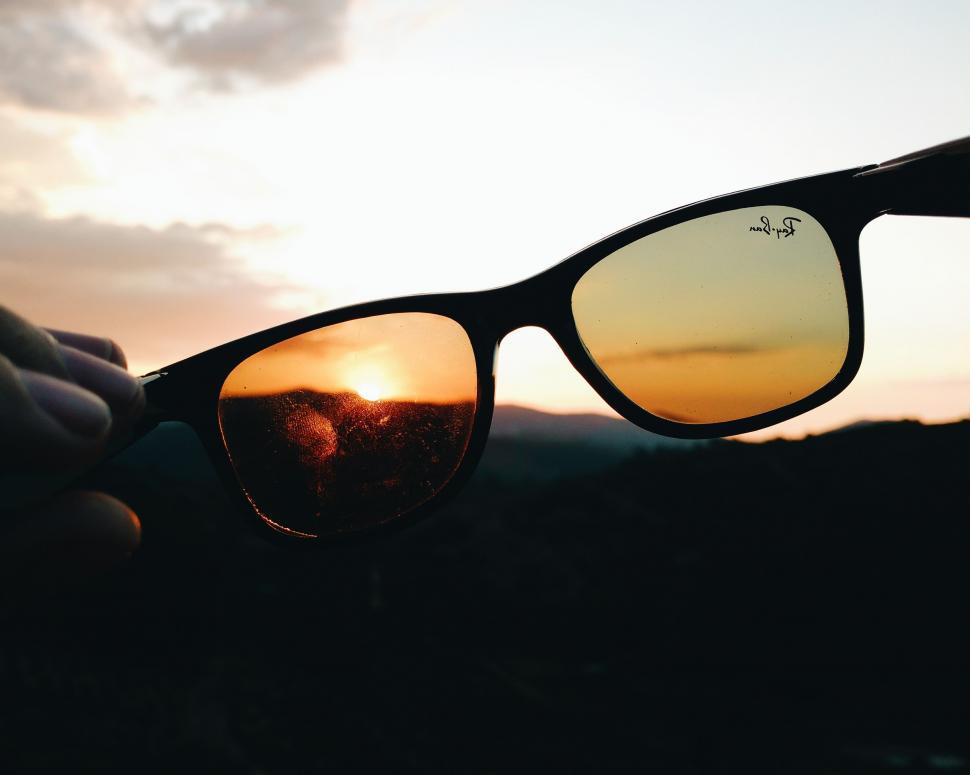 Free Image of Sun through Sunglasses  