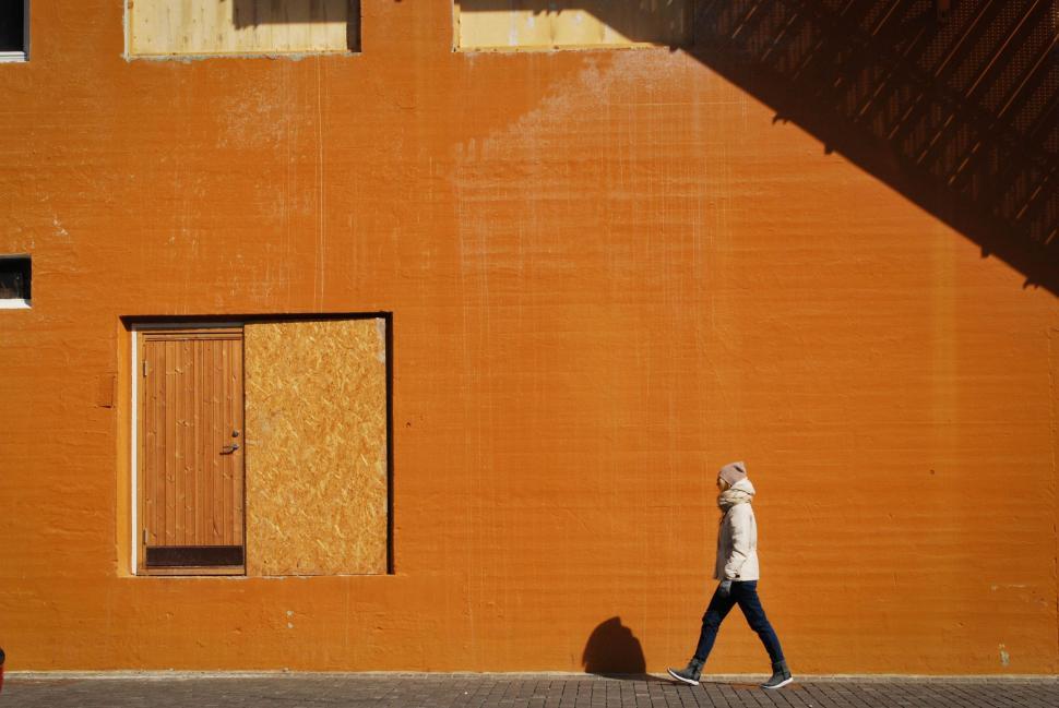 Free Image of Girl Walking on sidewalk  