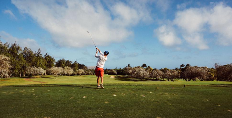 Free Image of Golfer taking a shot  