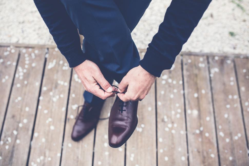 Free Image of Tying shoe laces 