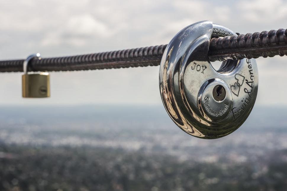 Free Image of Padlocks on iron rod 