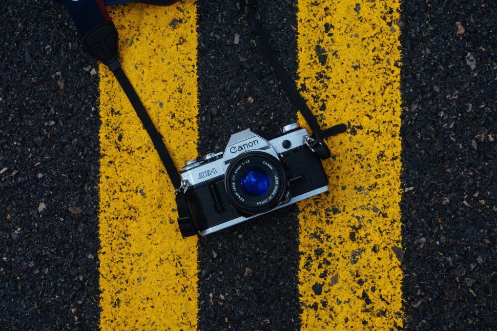 Free Image of Canon Camera with Strap 