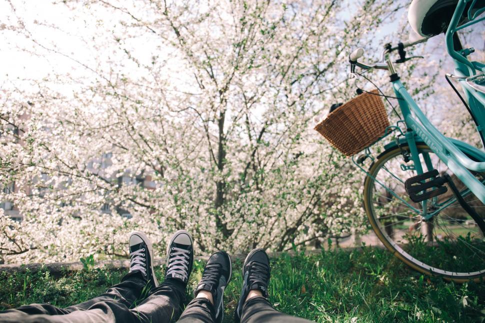 Free Image of Couple Feet Lying on Grass 