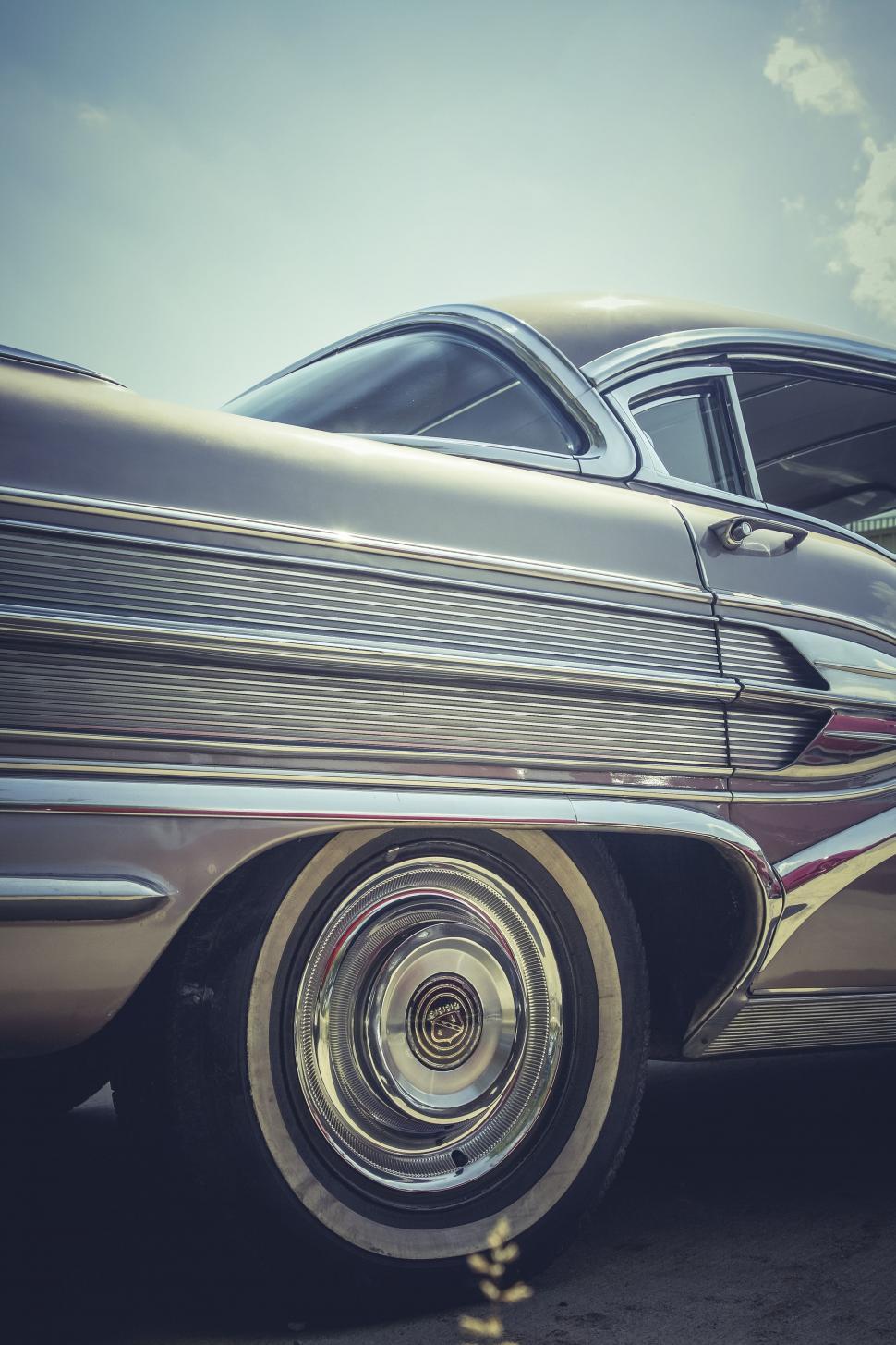 Free Image of Retro Car and Chrome Wheel  