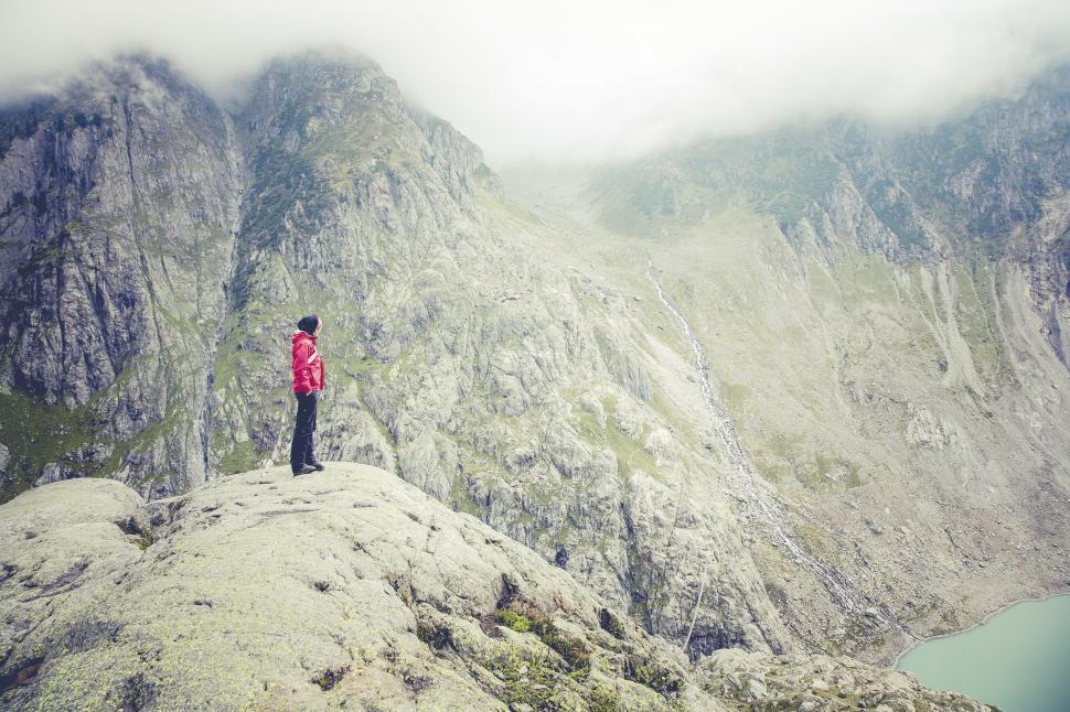 Free Image of One Person Standing on Rock Mountain  