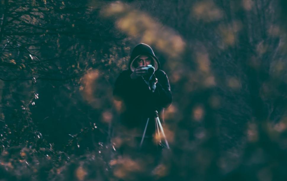 Free Image of Photographer with camera - eye contact  