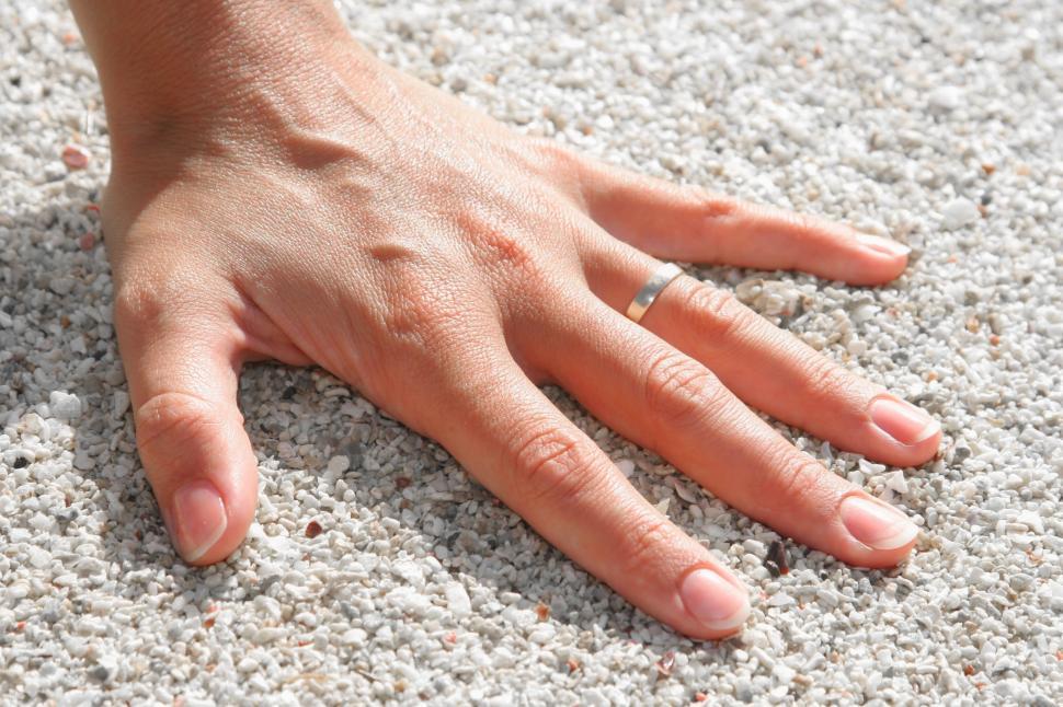 Free Image of Hand and pebble stones 