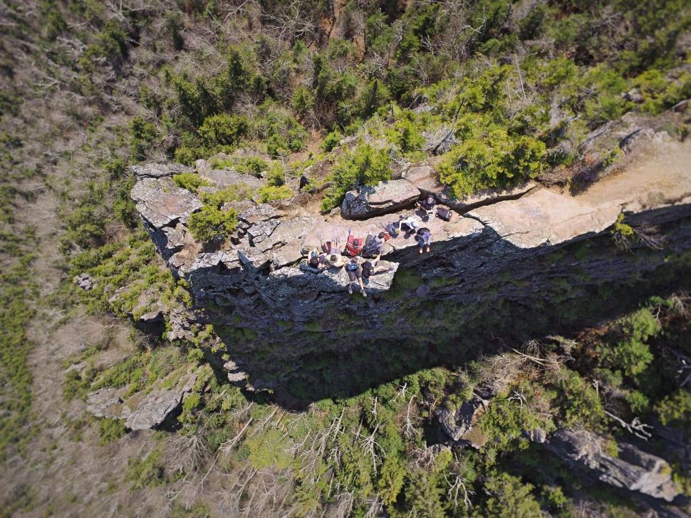 Free Image of Hikers Resting on Cliff  