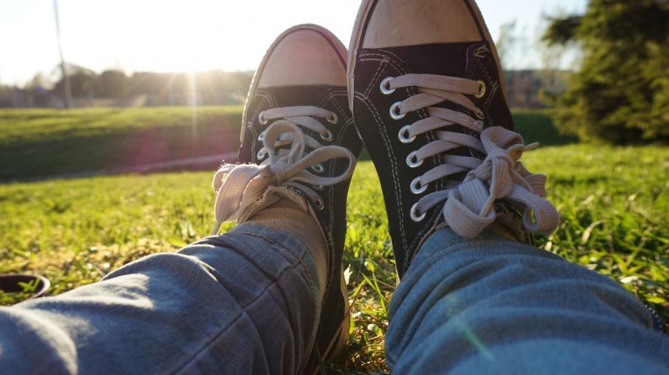Free Image of Converse Shoes in Feet  