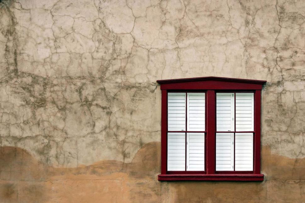 Free Image of Stucco and adobe with clean window 