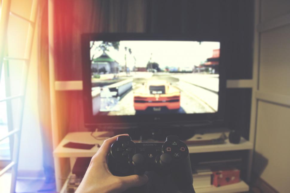 Free Image of Playing on the console  