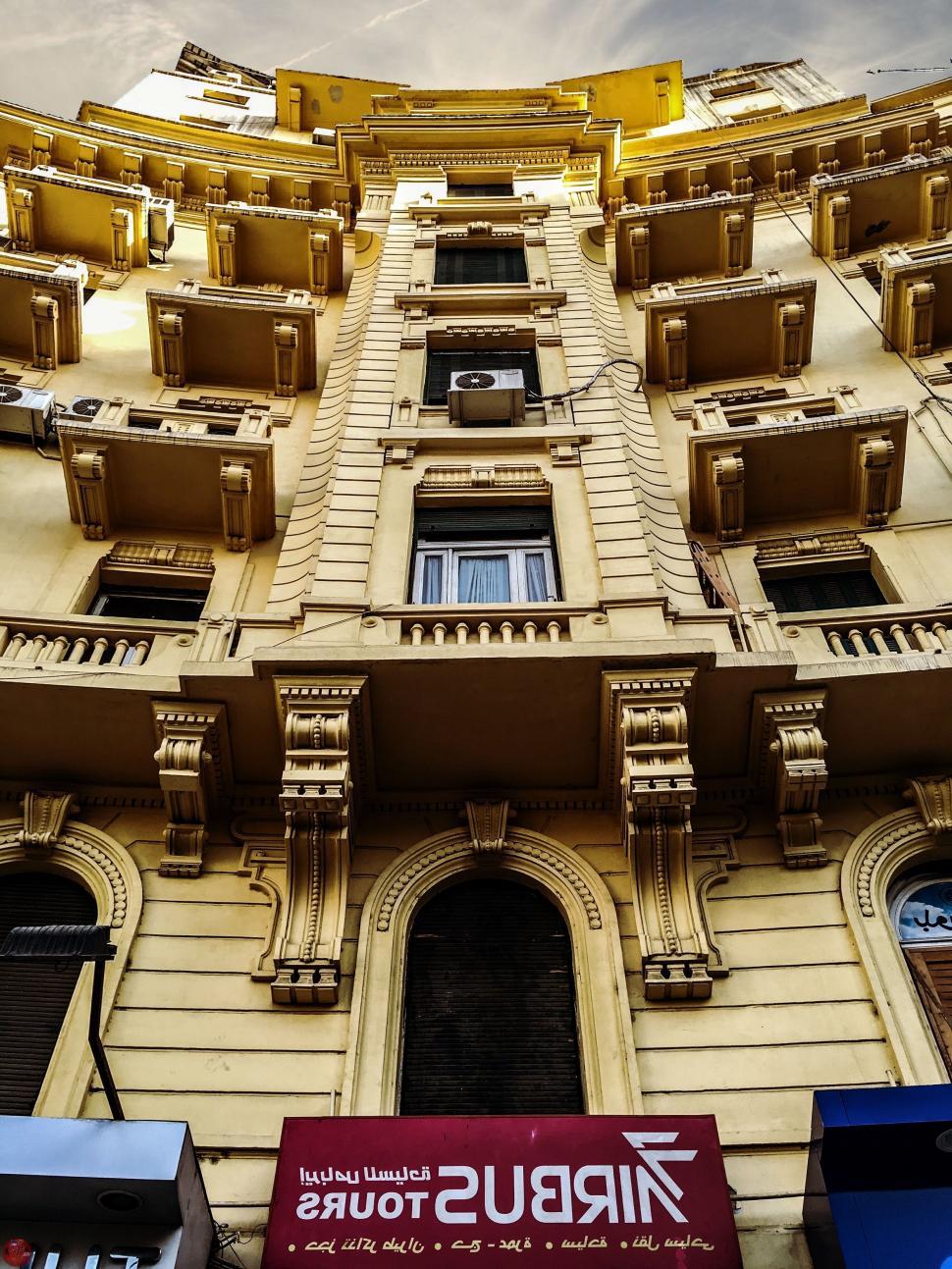 Free Image of Yellow Building from Below  