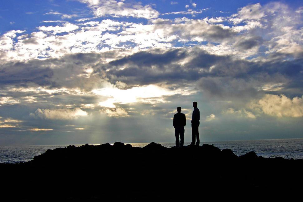Free Image of Silhouette view of people at seashore  