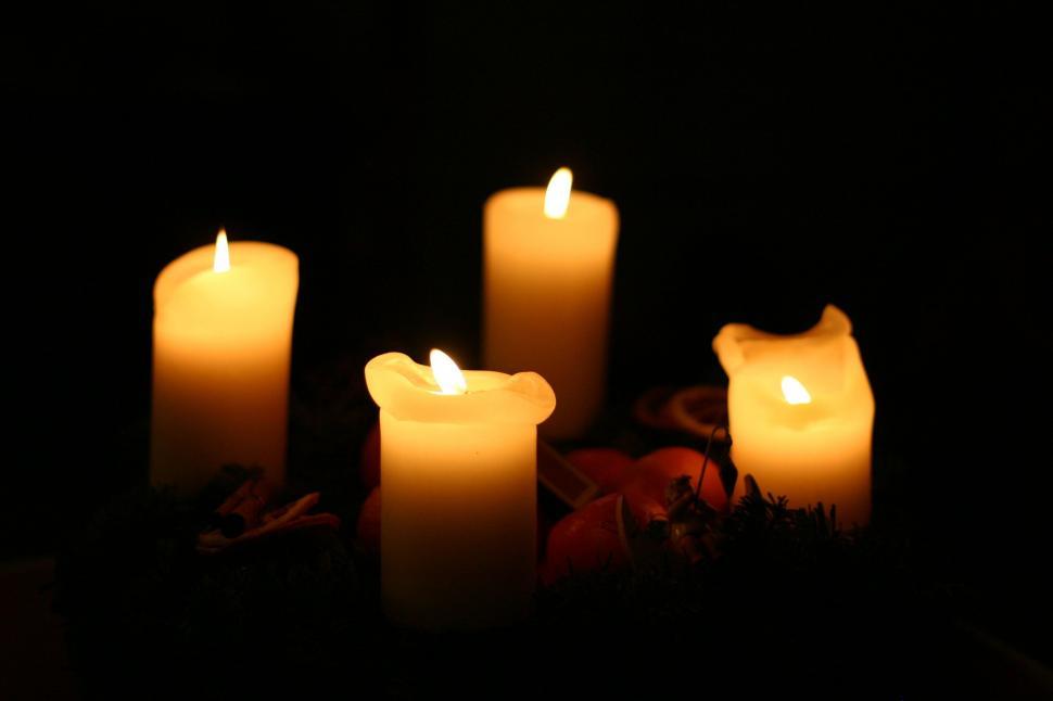 Free Image of Burning Candle on black background  