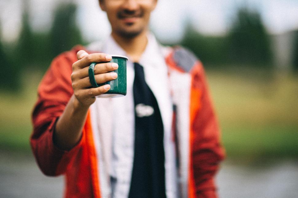 Free Image of Hand with coffee mug 