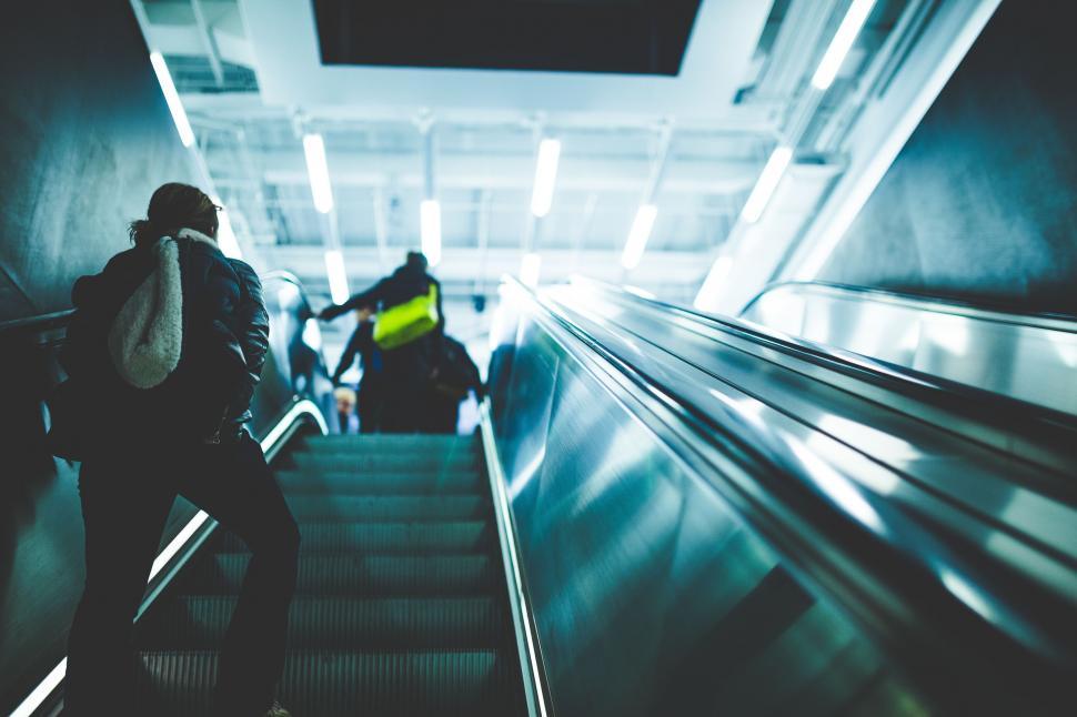 Free Image of Commuters on Escalator   