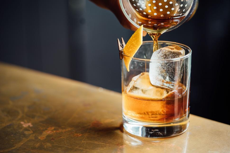 Free Image of Pouring liquor in glass 