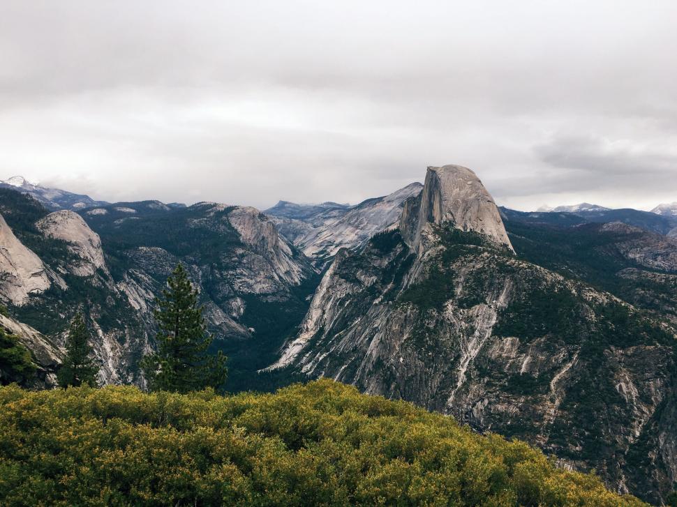 Free Image of Mountain Peak and White Clouds  