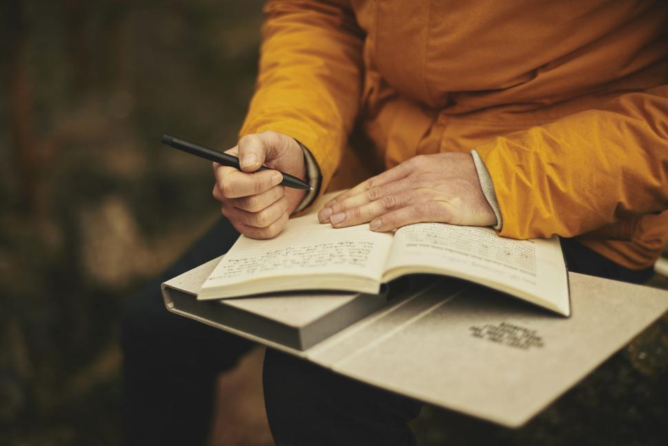 Free Image of Writing on notepad 