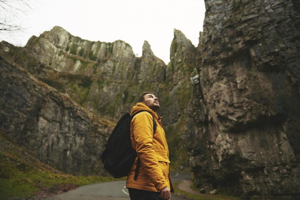 Free Image of Hiker on mountain road  