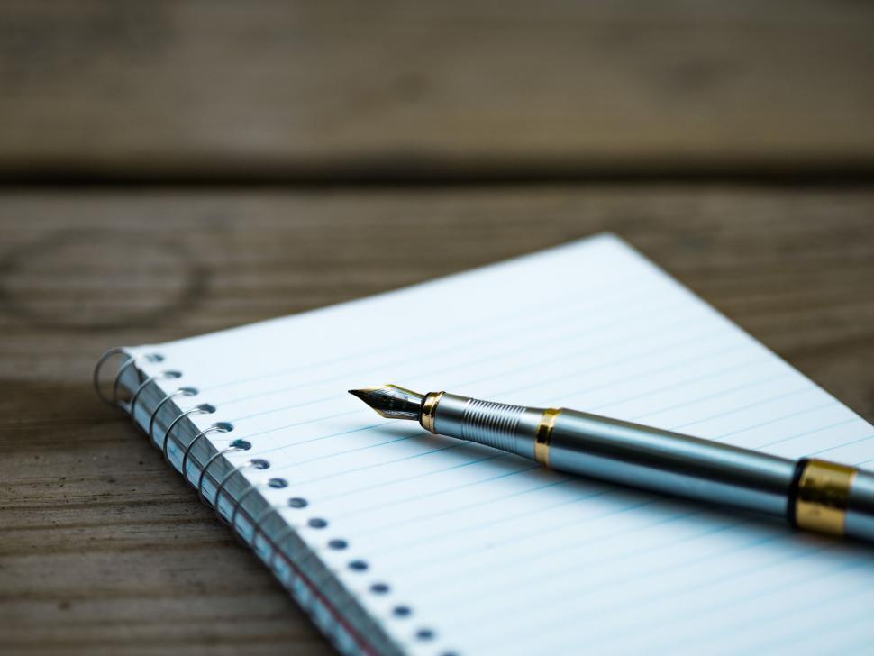 Free Image of Notebook and Pen  