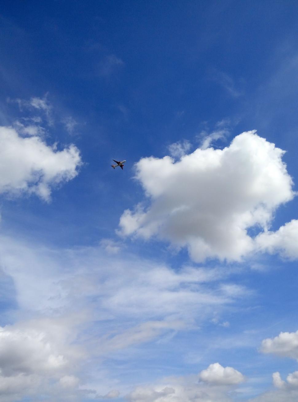 Free Image of Aircraft and white clouds  