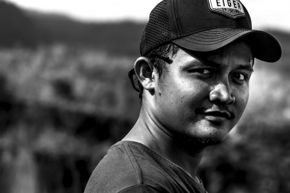 Free Image of Young Man in Cap - Eye Contact  